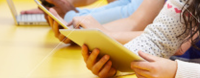 stock-photo-34193854-students-studying-in-classroom-with-digital-devices.png