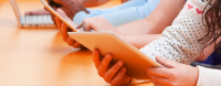 students-studying-in-classroom-with-digital-devices.jpg