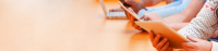 students-studying-in-classroom-with-digital-devices-1680.jpg